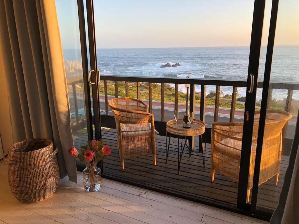 This stunning apartment has the loveliest view of Walker Bay brimming with sea life and rich with the Champagne air